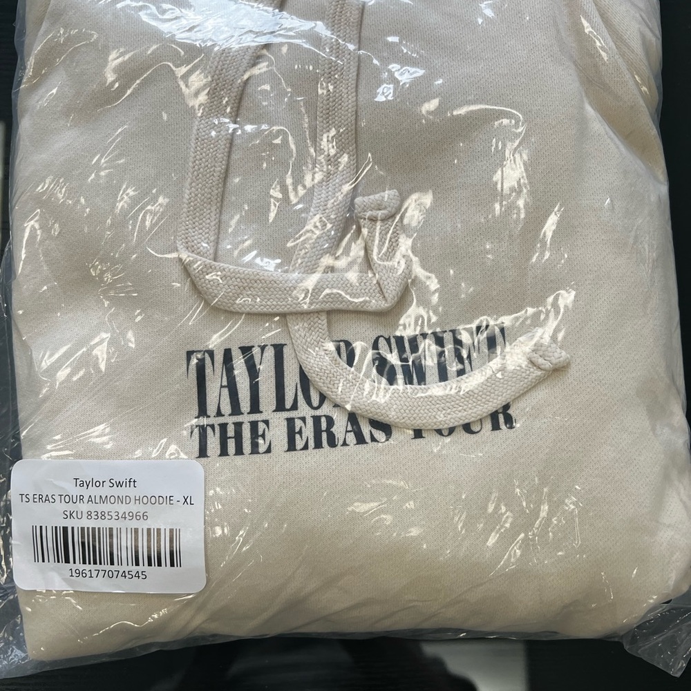 New with Tags: Taylor Swift Eras Almond Hoodie. I have 2 Large and 1 XL